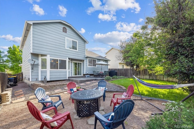 23634 Broadmoor Dr, Parker, CO 80138 - back of house with an outdoor fire pit, a patio area, and a fenced backyard