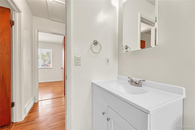 3490 Mowry Pl, Westminster, CO 80031 - bathroom featuring wood finished floors and vanity