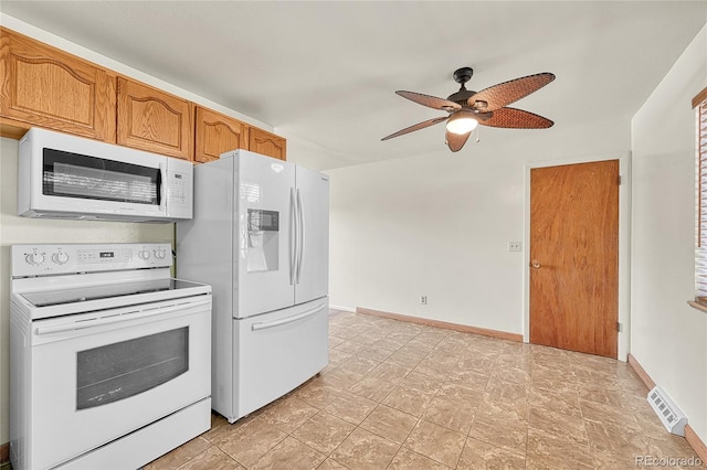3490 Mowry Pl, Westminster, CO 80031 - kitchen featuring white appliances, a ceiling fan, and brown cabinets