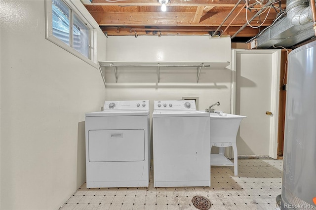 3490 Mowry Pl, Westminster, CO 80031 - laundry area with light floors, washing machine and dryer, and water heater