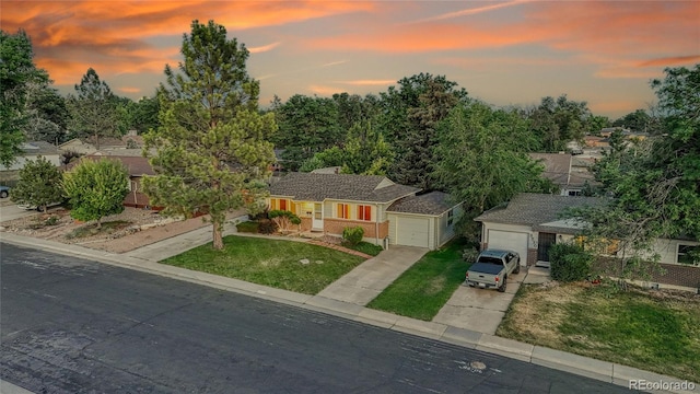 3490 Mowry Pl, Westminster, CO 80031 - view of front of house with a lawn and driveway