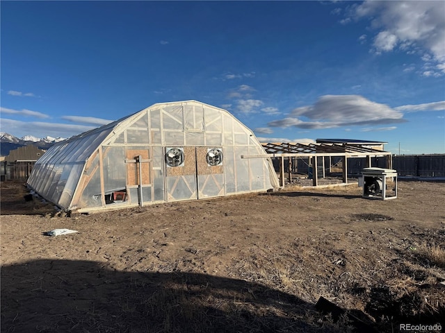 view of outdoor structure featuring a mountain view