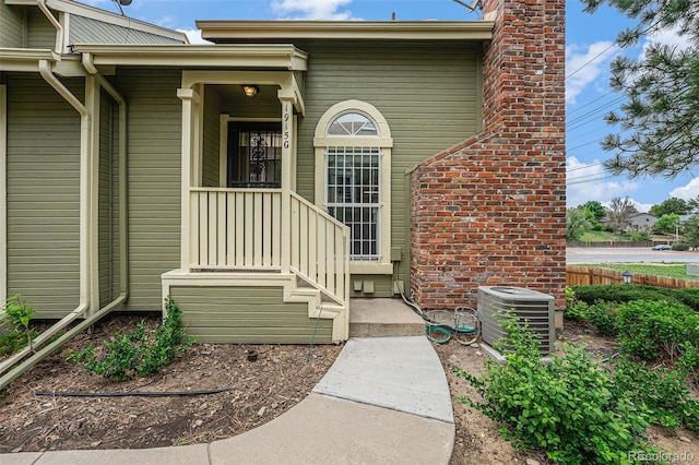 1915 S Hannibal St Unit G, Aurora, CO 80013 - entrance to property featuring central AC unit