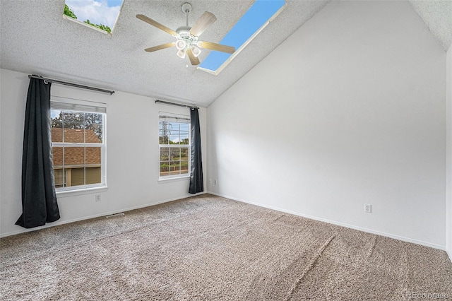 1915 S Hannibal St Unit G, Aurora, CO 80013 - carpeted empty room with a textured ceiling, a ceiling fan, vaulted ceiling, and baseboards