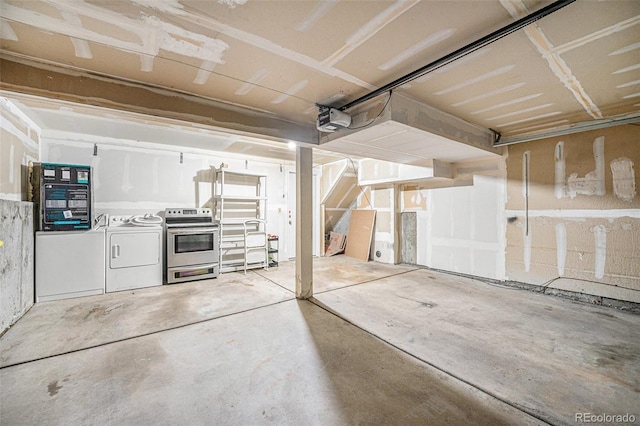 1915 S Hannibal St Unit G, Aurora, CO 80013 - garage featuring washer and dryer and a garage door opener