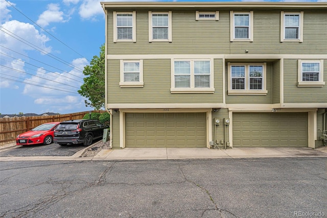 1915 S Hannibal St Unit G, Aurora, CO 80013 - view of property featuring an attached garage