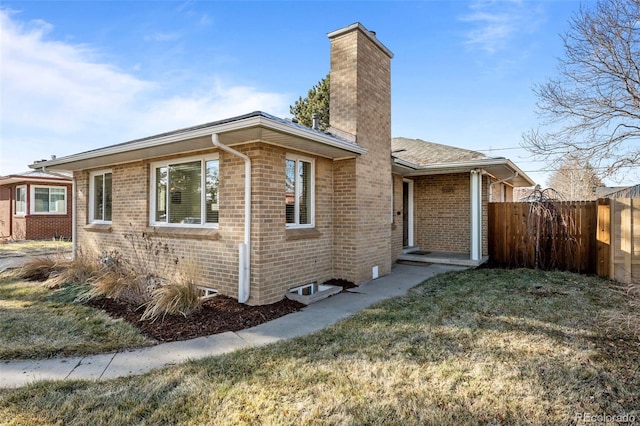 exterior space with a front lawn