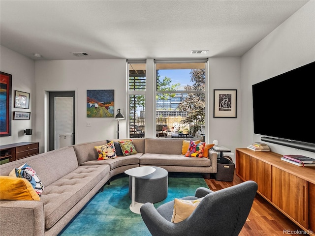 3133 Blake St Unit 3, Denver, CO 80205 - living area with wood finished floors