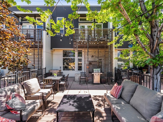 3133 Blake St Unit 3, Denver, CO 80205 - view of patio / terrace featuring an outdoor hangout area, a wooden deck, and outdoor dining area