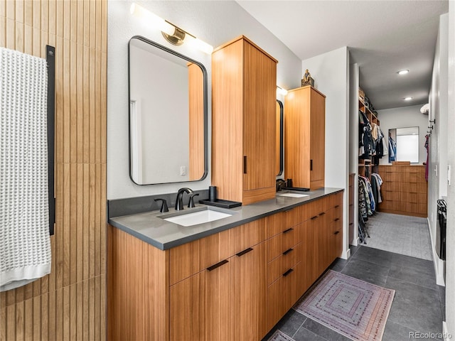 3133 Blake St Unit 3, Denver, CO 80205 - bathroom with double vanity and a spacious closet