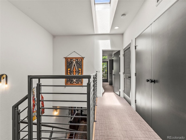 3133 Blake St Unit 3, Denver, CO 80205 - corridor with carpet flooring, an upstairs landing, and recessed lighting