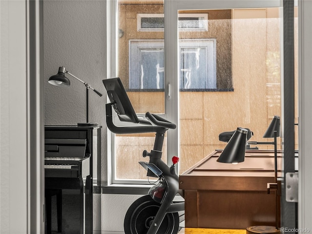3133 Blake St Unit 3, Denver, CO 80205 - workout room featuring a textured wall