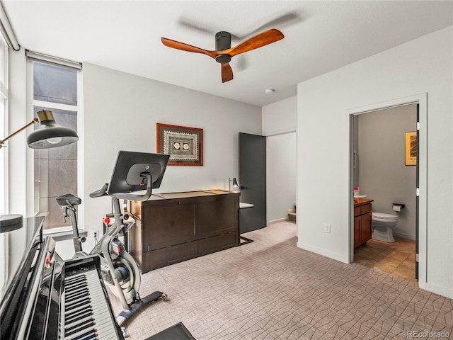 3133 Blake St Unit 3, Denver, CO 80205 - exercise room with a ceiling fan, carpet, and baseboards