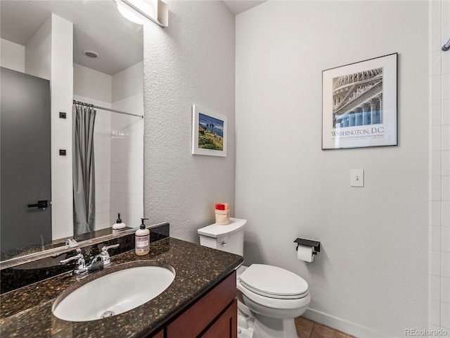 3133 Blake St Unit 3, Denver, CO 80205 - bathroom featuring vanity, curtained shower, toilet, tile patterned flooring, and a textured wall