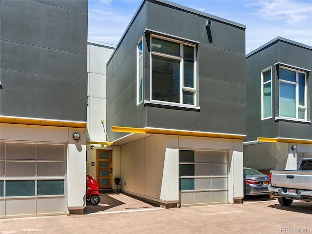 3133 Blake St Unit 3, Denver, CO 80205 - contemporary home featuring a garage