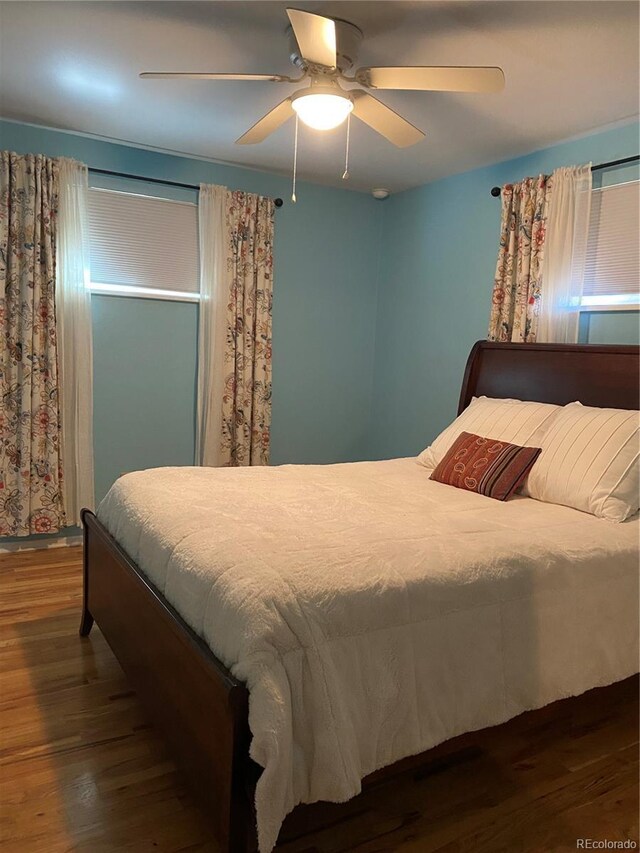 542 E Caley Dr, Centennial, CO 80121 - bedroom featuring wood finished floors and ceiling fan