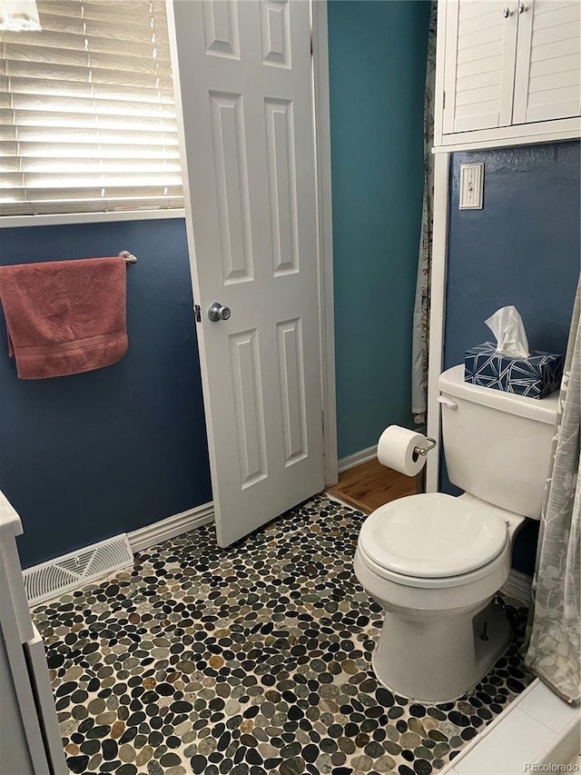 542 E Caley Dr, Centennial, CO 80121 - bathroom with toilet and baseboards