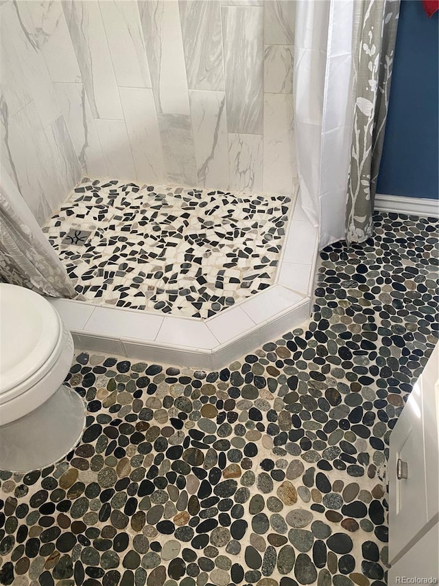 542 E Caley Dr, Centennial, CO 80121 - bathroom with a shower stall and toilet