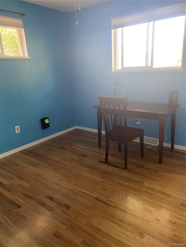 542 E Caley Dr, Centennial, CO 80121 - unfurnished office with wood finished floors and baseboards