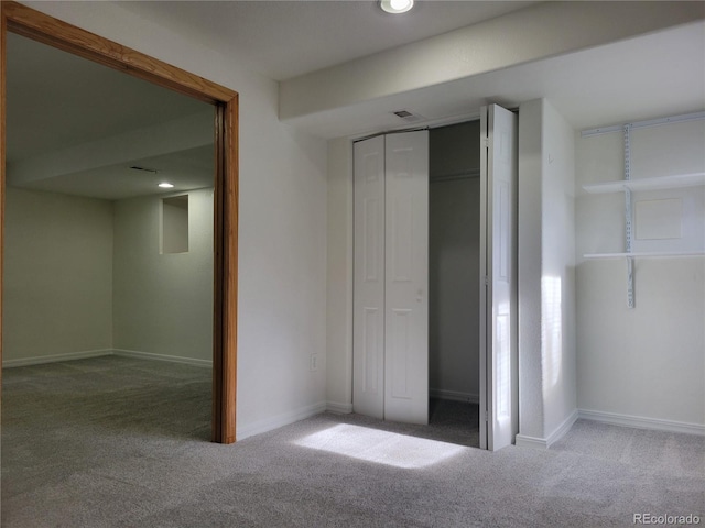 1250 Acropolis Dr, Lafayette, CO 80026 - unfurnished bedroom featuring carpet flooring, a closet, and baseboards