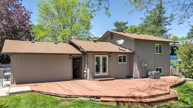 1250 Acropolis Dr, Lafayette, CO 80026 - rear view of house with french doors, a deck, roof with shingles, and central AC unit