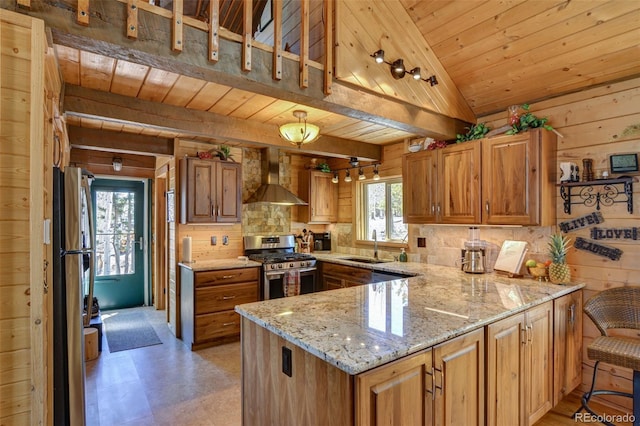 kitchen featuring gas range, wooden ceiling, a peninsula, and wall chimney range hood