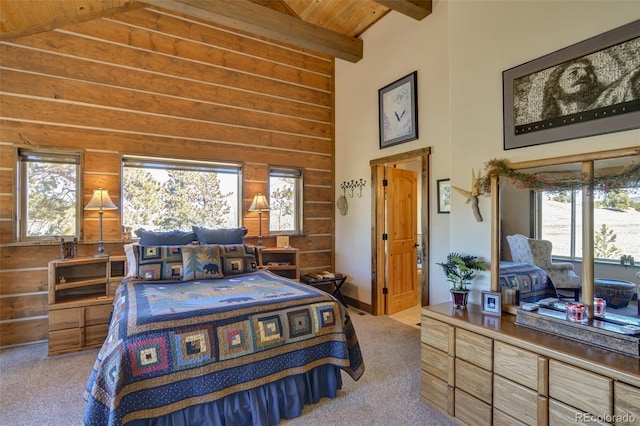 carpeted bedroom with beam ceiling, wooden ceiling, and high vaulted ceiling