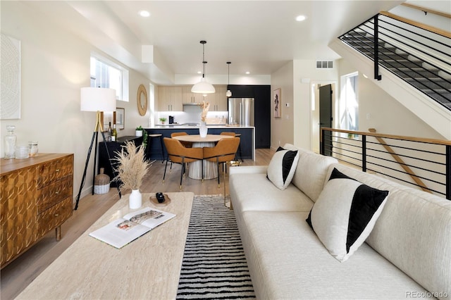 living room featuring light wood-type flooring