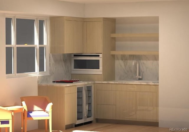 kitchen featuring light wood-type flooring, wall oven, and wine cooler