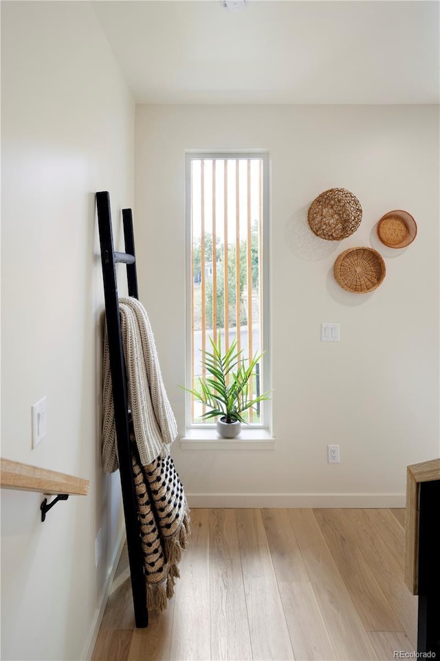 sitting room with light wood-type flooring