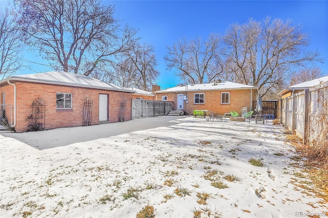 view of snow covered property