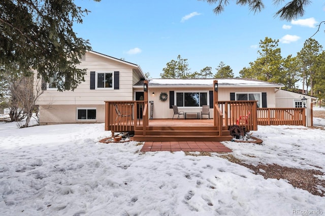 view of front of property featuring a wooden deck