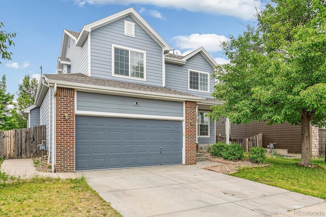 15762 Olmsted Pl, Denver, CO 80239 - view of front of home featuring brick siding, driveway, a garage, and a shingled roof