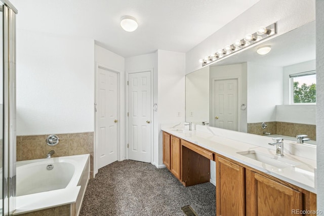 15762 Olmsted Pl, Denver, CO 80239 - full bathroom with double vanity, a garden tub, and a closet