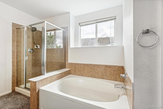 15762 Olmsted Pl, Denver, CO 80239 - bathroom featuring a garden tub, a shower stall, and a textured wall