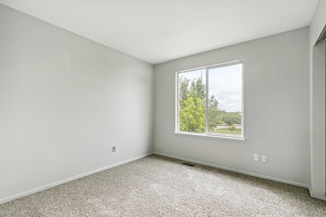 15762 Olmsted Pl, Denver, CO 80239 - unfurnished room with light colored carpet and baseboards
