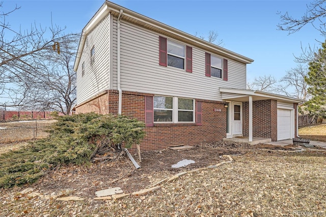 front of property with a garage