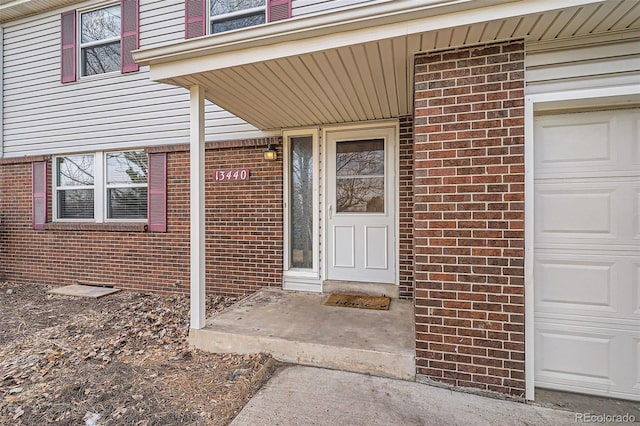 entrance to property featuring a garage