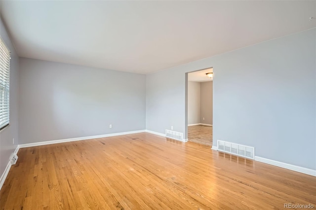 unfurnished room featuring light wood-type flooring