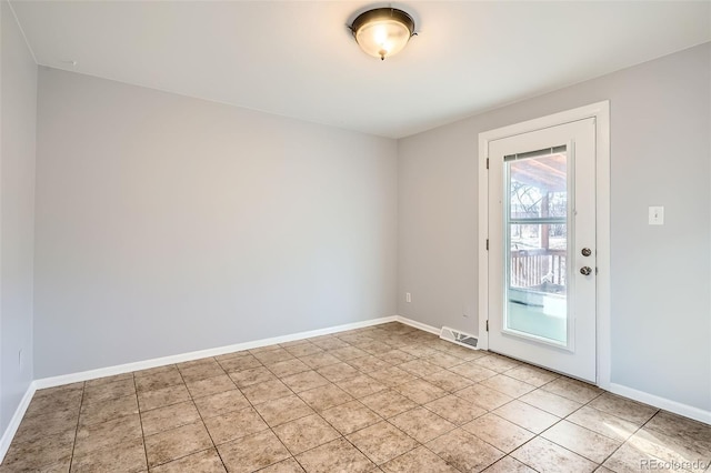 view of tiled spare room