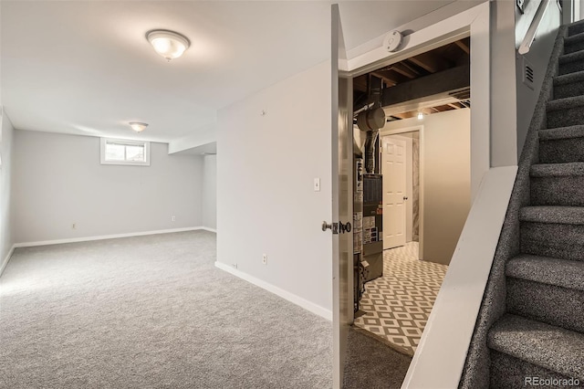 basement with carpet flooring