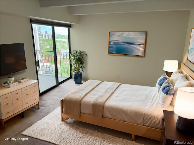 777 N Washington St Unit 1007, Denver, CO 80203 - bedroom featuring carpet floors, access to exterior, and beam ceiling