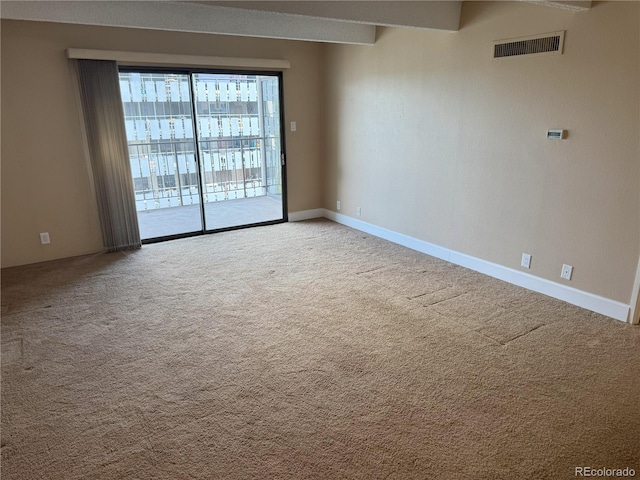 777 N Washington St Unit 1007, Denver, CO 80203 - carpeted empty room featuring baseboards