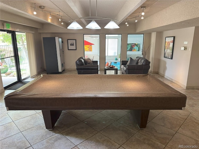 777 N Washington St Unit 1007, Denver, CO 80203 - game room featuring rail lighting, billiards table, a textured ceiling, and tile patterned floors