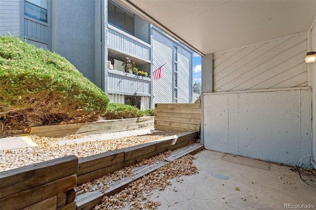 interior details with concrete floors and wooden walls