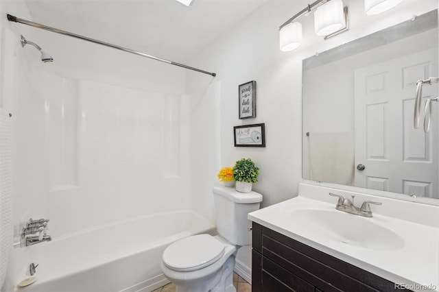 bathroom featuring bathtub / shower combination, vanity, and toilet