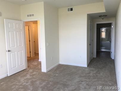804 Summer Hawk Dr Unit 6105, Longmont, CO 80504 - unfurnished bedroom featuring carpet