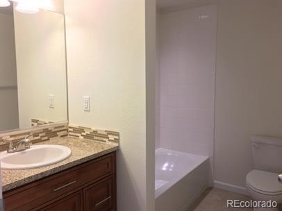804 Summer Hawk Dr Unit 6105, Longmont, CO 80504 - full bath featuring vanity and shower / washtub combination