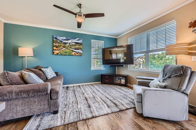 24748 E Layton Pl, Aurora, CO 80016 - living room featuring crown molding, wood finished floors, and ceiling fan