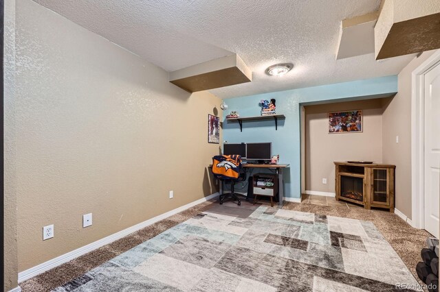 24748 E Layton Pl, Aurora, CO 80016 - office featuring a textured ceiling, carpet flooring, and a textured wall